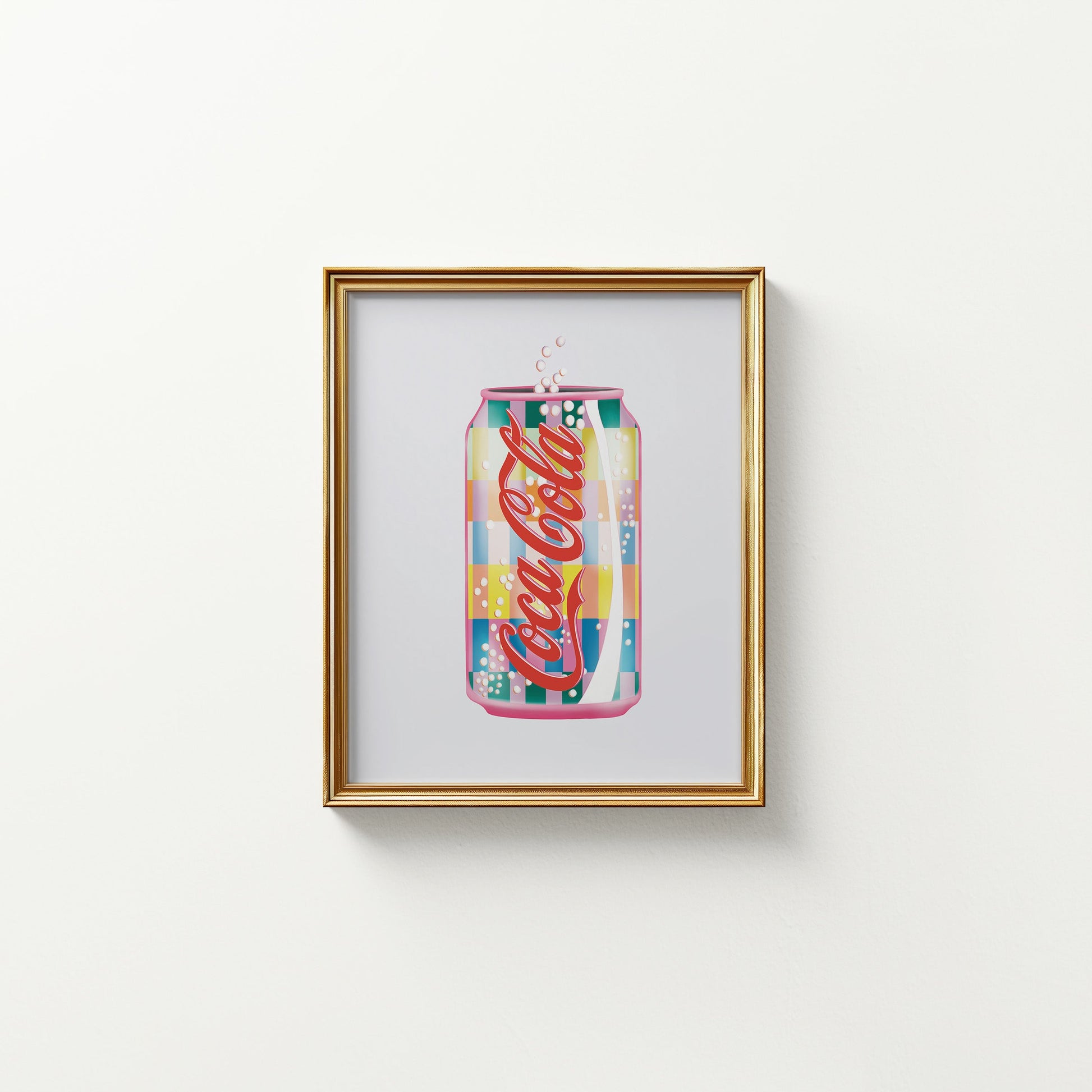 Framed artwork of a colorful Coca-Cola can on a white background